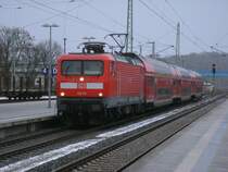 Beim ersten Schnee erreichte 112 111 mit dem RE 13028 Binz-Stralsund,am 30.November 2012,Bergen/R�gen.