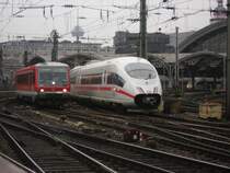 HBF in K�ln ICE und S Bahn bei der Ausfahrt in K�ln vom HBF 
Bild ist entsanden am 24.11.2012.