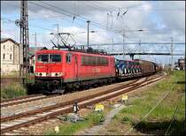 155 023-5 mit einem G�terzug unterwegs zum F�hrhafen Mukran.  (Stralsund am 26.05.06) 