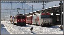 Ge 6/6 II 706  Disentis/Must�r  und Ge 4/4 III 649  Lavin  in Landquart. (14.12.2012)