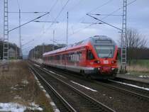 Als RE 13027 Stralsund-Binz verlie� 429 028,am 20.Dezember 2012,die Station Teschenhagen.