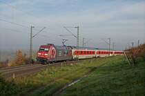 101 110-5  Eintracht Frankfurt  mit CNL 473 Koebenhavn H - Basel SBB und den ersten Sonnenstrahlen in Rheinweiler. 09.11.12