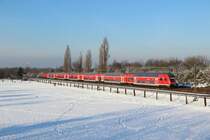 Der RE 5 nach Koblenz Hbf bei der Durchfahrt durch Langenfeld (Rheinland) am 08.12.2012