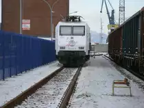 Leider nur von Vorne und durch das Hafentor konnte ich,am 24.Januar 2013,die PRESS 145 023 im Stralsunder Nordhafen fotografieren.