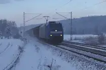 185 514 f�hrt am 09.02.2013 mit einem H-Wagenzug auf der Frankenwaldbahn bei Nagel. 