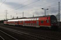 Hier eine RB14 (RB18570) von Senftenberg nach Berlin Schönefeld Flughafen, bei der Einfahrt am 6.2.2013 in Berlin Schönefeld Flughafen.
