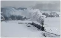 52.100 vom Heizhaus Strasshof nimmt mit ihrem SR 14370 am 17.2.2013 die Steigung am Mollmannsdorfer Berg in Angriff. (Televersion) 

http://www.eisenbahnmuseum-heizhaus.com/

