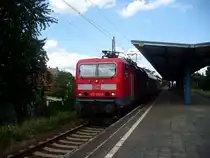 143 556-9 mit einem RE18 nach Falkenberg (Elster) am 12.06.11 abfahrbereit in Drebkau.