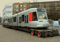 Werbung f�r eine Stadtbahn auf dem Willy Brand Platz am 03.03.2013 in Aachen. Triebwagen 3371 der Rheinbahn aus D�sseldorf in der Aachener Innenstadt auf einem Tieflader. Am 10. M�rz wird in einem B�rgerenscheid dar�ber abgestimmt ob solche Niederflurwagen hier auch mal auf Schienen zu sehen sind.