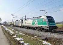 1216 960 und ein Wlb-Fahrzeug mit einem Containerzug am 03.03.2013
bei Marchtrenk.