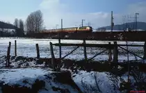 Auf der Nord-S�dstrecke bei Kreiensen ist im Februar 1985 eine 103 mit einem IC unterwegs