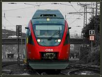 Triebwagen der Reihe 4024, unterwegs auf der Vorortelinie in Wien zwischen H�tteldorf und Handelskai am 19.8.2006 bei der Einfahrt in Penzing.