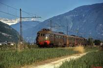 An einem sonnigen Märztag 1985 ist eine ALe 840-Garnitur zwischen Bolzano/Bozen und Merano/Meran unterwegs