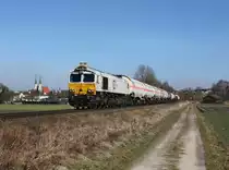 Die 247 052 mit einem G�terzug am 08.03.2013 unterwegs bei Alt�tting.