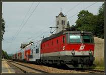 1144 223 mit dem E 7124  Steiner Tor  von Wien FJB nach Krems bei der Durchfahrt in Greifenstein-Altenberg am 19.8.2006