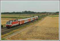 1014 002 bespannte am 3.8.06 den E 2821 „L�verek“ von Wien nach Deutschkreuz. Die Aufnahme entstand kurz nach dem Bahnhof Wampersdorf.