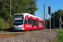 Im bunten Farbkleid.......pr�sentiert sich ebenfalls Saarbahn Triebwagen 1016 mit Bauhaus Werbung.

Die Bahn �berquert an dieser Stelle den  Russenweg  zwischen Riegelsberg und dem Ortsteil Walpershofen.

Der Russenweg bekam seinen Namen durch russische Kriegsgefangene, die im Jahr 1917 den Damm als Verbindung von Riegelsberg nach Walpershofen und Etzenhofen durch das damals sumpfige Tal bauten.

15 Oktober 2011