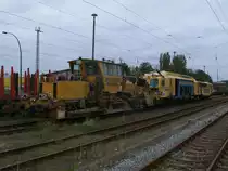 Schotterplaniermaschine SSP110SW und eine Gleisstopfmaschine Unimat 09-32/4S Dynamic,am 21.September 2011 in Bergen/R�gen.