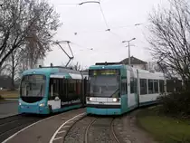 Zwei mal  RNV  in den langsam seltener werdenden, ehemaligen Farben der  MVG  an der Endhaltestelle in Rheinau. Ich pers�nlich fand diese Lackierung sch�ner als das aktuelle Orange, aber das ist Geschmackssache. Fotografiert am Morgen des 18.03.2013. 