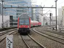 RB 14 nach Berlin-Sch�nefeld am 01.03.13 bei der Einfahrt in den Bahnhof Zoo.