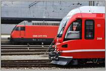 Re 460 058-1  La C�te  und ABe 4/16 3104  Achilles Schucan) beim Stelldichein in Landquart. (24.03.2013)