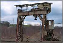 Ein Symbol aus vergangerner Zeit.Der alte Verladekran in Gare de Montzen (B).
Wie lange wird er wohl noch vor sich hinrosten? Auf jeden Fall ein Motiv wert.
Aufnahme vom Februar 2013.