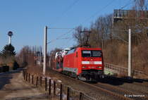 M�chtig zu tun hatte 152 170-7 mit ihrem G�terzug auf dem Weg zum Skandinavienkai. Aufgenommen am 3.04.13 bei Bad Schwartau-Waldhalle.