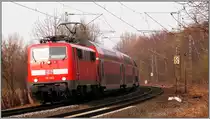Der Wupper Express (RE 4),unterwegs nach Aachen. Bildlich festgehalten in Rimburg
(�bach Palenberg) Anfang April 2013. Als Zugpferd die 111 093.