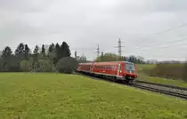 611 035+Schwesterfahrzeug legt sich m�chtig in die Kurve mit IRE 3254 von Aulendorf nach Stuttgart.Bild entstand bei Reutlingen-Sopndelfingen am 7.4.2013 auf der Neckar-Alb-Bahn(KBS 760).