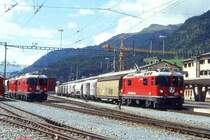 RhB G�terzug 5552 von St.Moritz nach Landquart am 04.09.1996 in Samedan mit E-Lok Ge 4/4 II 619 - Haikqy 5167 - Uce 8083 - Uce 8050 - Uace 7991 - Ucek 8054 - Uce 8037 - Gbkv 5525 - Gbkv 5512 - Gbkv 5518 - Gbkv 5609 - Haikqy 5163. Hinweis: gescanntes Dia
