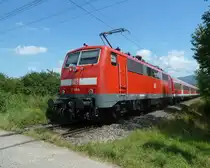 111 064 mit einer RB nach Offenburg am 04.08.11 kurz vor dem ESig G von M�llheim (Baden).
Der Zug kommt aus Neuenburg (Baden).
