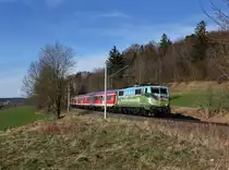 Die 111 039 mit einer RB nach Mittenwald am 14.04.2013 unterwegs bei Weilheim.