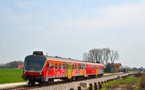 S� 814-129 f�hrt durch Gaj bei Pragersko Richtung Maribor. /17.4.2013