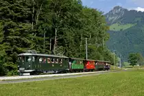TPF/GFM: Ex GFM Be 4/4 111 mit historischen Wagen unterwegs zwischen Bulle und Broc am 23. Juni 2012, anlässlich der Feier zum hundertjährigen Bestehen dieser Strecke.
Foto: Walter Ruetsch