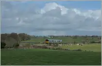 Ein Class 2800 Triebzug auf dem Weg von Galway nach Limerick bei Ardrahn. 
Im M�rz 2010 konnte nach 34 Jahren Betriebsruhe die Strecke (Limerick)- Ennis - Athenry - (Galway) wiederer�ffent werden. Zudem ist auch die Wiederinbetriebnahme des n�rdlichen Teils (Galway) -Athenry - Westport ist beabsichtigt.
21. April 2013