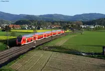 RE 5338 (Basel SBB-Offenburg) am 25.04.2013 bei Kollmarsreute. Schublok war eine BR 146 mit Werbung  Baden-W�rttemberg erfahren .