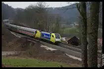 182 515, von MRCE Dispolok f�r DB Fernverkehr unterwegs, hat am 23.03. den IC2082  K�nigssee  von Berchtesgaden nach Hamburg am Haken und erreicht gleich Treuchtlingen.