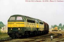 SNCB - GM 5316 & 5211 - 06/1996 - Bertrix - Abfahrt mit einem schweren G�terzug nach
Virton und weiter, warscheinlich nach Frankreich �ber Luxemburg. Diese Strecke ist jetzt total elektrifiziert und diese ber�hmte Diesellokomotiven existieren nicht mehr.  Foto : J.J. Barbieux