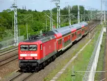 Am 23.05.2013 kam 114 002 mit dem RE 20 von Halle(Saale)nach Uelzen durch Stendal.(Fotostelle ist Warburg bei Stendal auf der Fussg�ngerbr�cke)
