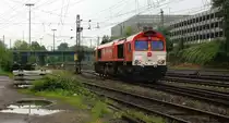 Ein Nachschuss von der Class 66 DE6311  Hanna  von Crossrail f�hrt als Lokzug von Aachen-West nach Montzen(B) bei der Ausfahrt aus Aachen-West und f�hrt in Richtung Montzen/Belgien. Bei Regenwolken am Abend des 17.5.2013.