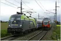 CAT 1116 141 zieht den EC 103 Polonia in Richtung Villach, w�hrend im Vordergrund 4024 040 in Richtung Bruck an der Mur rollt. 
Zeltweg 7.5.2013