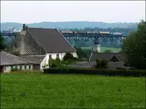Ein Jahr ist es nun her. Im Juni 2012 enstand dieses Foto und zeigt eine belgische 
Cobra (E-186) mit ihrer G�terfracht auf dem Moresneter Viadukt in Belgien.