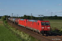 185 346-4 und ihre Schwesterlok passieren am 05.06.13 mit einem Kesselwagenzug von der Hohen Schaar Ramelsloh Richtung Bremen.