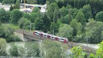 Ein 4024 als REX 5224 von St. Johann in Tirol nach Brennero/Brenner am 17. Mai 2013 auf der Innbr�cke in Brixlegg.