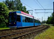 Rostock: Stra�enbahnlinie 2 nach Bahnhof Rostock-Dierkow Kurt-Schumacher-Ring an der Haltestelle Rostock-Dierkow Dierkower Kreuz.(3.6.2013) 