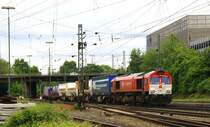 Die Class 66 DE6311  Hanna  von Crossrail kommt aus Richtung Montzen/Belgien  mit einem langen Containerzug aus Genk-Zuid-Haven(B) nach Gallarate(I) und f�hrt in Aachen-West ein bei Sonne und Wolken am 30.5.2013.