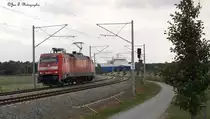 152 022-0
Kommt hier am 14.06.2013 um 12:27:00 Uhr leer vom Skandinavienkai zur�ck. Im Hintergrund ist die Finnlines zu sehen die grade in denn L�becker Hafen einf�hrt.