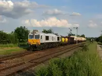 Die 247 050 mit einem G�terzug am 07.06.2013 bei der Ausfahrt aus T��ling.