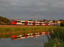 4024 055 und 4024 051 sind am 30.06.2013 als Rex 3914
im letzten Abendlicht in Wartberg an der Krems ausgefahren.