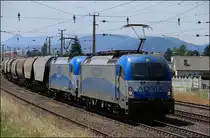 ADRIA 1216.920 und 1216.921 mit Getreide-Leerzug am 08.07.13 im Bhf Neunkirchen/N� Richtung Wr.Neustadt.
